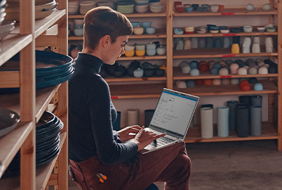 a man is working with a business laptop